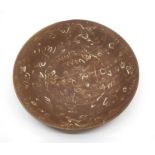 A Shipwreck “SWATOW” dish from The Hatcher Junk, covered in a brown glaze and decorated with a