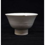 A Song Dynasty Qingbai bowl, from Jiangxi province, the steeply rounded sides raised on a high