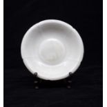 A Southern Song Dynasty Qingbai small foliate shallow dish from the Jiangxi province. The rim shaped