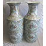 A large pair of 19th century Chinese vases. Decorated with family scenes, Dragons, Birds, squirrels,