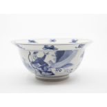 A Qing Dynasty Kangxi period blue and white “Hunting Bowl”of ‘Klapmuts’ shape. The rounded sides