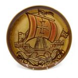 Poole Pottery: A Poole Pottery Aegean charger depicting a galleon in full sail. Diameter approx 32.