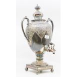 A late 19th Century / early 20th Century silver plated twin handled water pot / samovar on a