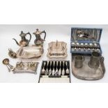 An early 20th Century silver plated inkstand, with pair of glass bottles and plated covers (damage