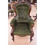 A Victorian mahogany balloon back armchair