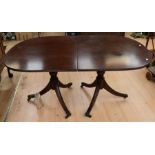 A reproduction mahogany d-end dining table (two leaves) together with a set of eight Chippendale