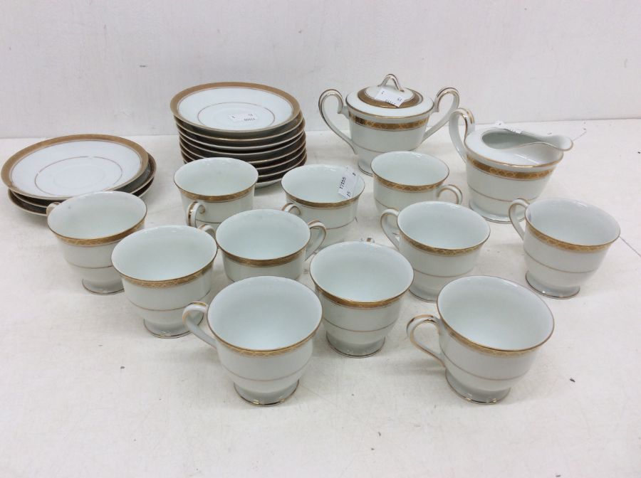 A Japanese Noritake china 10 piece coffee service to include cups, saucers, sugar bowl and milk