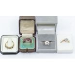 A collection of gem set 9ct gold rings to include a garnet set dress ring, size Q, a sapphire and cz
