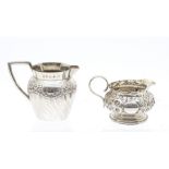 Two Victorian silver small cream jugs, both hallmarked Birmingham, 1888 & 1891, approx 72.25
