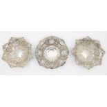 A pair of Victorian floral shaped silver bon bon dishes, reticulated sides, chased bodies,
