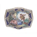 An early 20th Century Continental probably French silver and enamel cartouche shaped snuff box,
