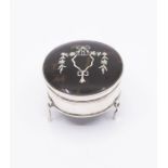 A George V silver and tortoiseshell circular ring box, the cover inset with Neo-Classical