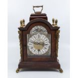 A German reproduction mahogany domed top 8-day moonphase bracket clock, by John Thomas, brass