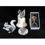 Swarovski crystal 10th anniversary edition squirrel , a 100th anniversary swan on a pedestal , a