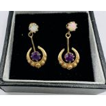 A pair of Amethyst and opal 9ct gold drop earrings with post fittings.  Hallmarked for Birmingham