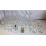 A decanter and stopper, other glassware to include drinking glasses with cut glass vases etc