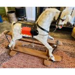 *****RE-OFFER £100 - £150*******  A 20th century wooden hand painted rocking horse, having a black/