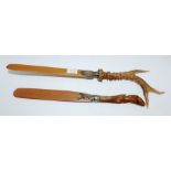 A Victorian letter opener with silver mount and deer antler, Edinburgh 1898, 39cm long another