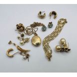 A selection of 9ct gold jewellery pieces to include a 9ct gold hallmarked locket and chain, a figaro