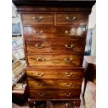 A George III mahogany chest on chest, circa 1800, dental cornice over a moulded frieze, above two