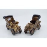 A Bretby novelty model of an early 20th motor car and a similar example, longest 18.5cm long  (2)