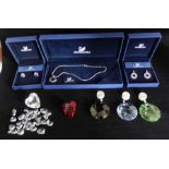 A collection of Swarovski  crystal  jewellery and pendants with original boxes and certificates