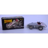 Schuco 1043 Micro Racer wind up clockwork car, silver no.7 with box and instructions