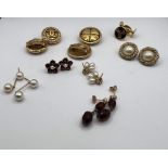 Two pairs of Chanel gilt earrings, with clip fastenings, two pairs of cultutred pearl earrings, a