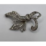 Sparkling platinum and diamond spray brooch - studded with round brilliant cut diamonds at a