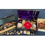 A large quantity of vintage and period costume jewellery in three boxes (two leather cases and a