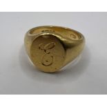 An 18ct yellow gold signet ring. Approx weight 7.0 grams.