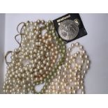 ***** RE-OFFER £10 - £20 *******        A lot of four strands of faux pearls, a gold tone chain and