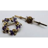 A pair of 9ct gold brooches, both hallmarked for birmingham: an Amethyst and seed pearl wreath