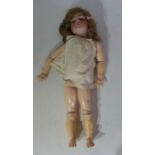 A German Simon and Halbig bisque head doll , number 53 , marked on back of head .