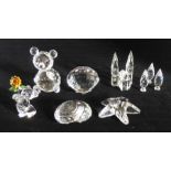 A collection of Swarovski  crystal sea shells , a church , set of 3 trees and 2 teddy bears with