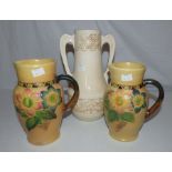 Two Bretby Art pottery jugs with incised decoration of passion flowers, impressed marks and no 3426