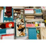A collection of 1970's dolls house furniture, some plastic and die cast examples, together with