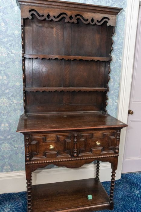 An oak small dresser with plate rack and pot board circa 1930, 91cm wide