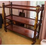 A Victorian mahogany three tier sideboard, on substantial castors, 137cm wide, 124cm high