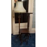 A Victorian gothick style gong with beater, an oak barley twist leg occasional table: a standard