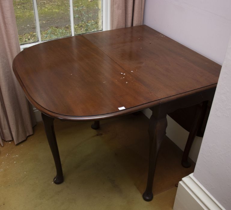 A mahogany drop leaf small dining table in Georgian style, rounded rectangular, on cabriole legs, - Image 2 of 2