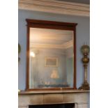 An Edwardian mahogany framed large bevelled overmantel mirror, 138cm high, 103cm wide