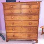A late 19th century large oak chest of four drawers beneath two upper cupboards, with mushroom