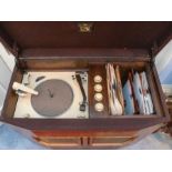 An HMV record player, model No. 2000 & Serial No. R/12 3847, with white enamelled deck, in a walnut