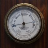 A late Victorian brass and bevelled glass aneroid wall barometer, A Johannsen & Co, 149 Minories,