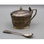 Henry Nutting, a George III silver mustard, oval thumbpiece and urn finial to the hinged cover,
