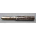 Joseph Taylor, a George III silver apple corer, the cylindrical case with bright cut decoration.