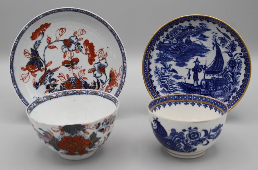 An 18th century Liverpool porcelain teabowl and saucer, decorated under and overglaze in blue,