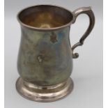 John Langlands I, a George III silver 1/2 pint mug of baluster form, with scroll handle on stepped