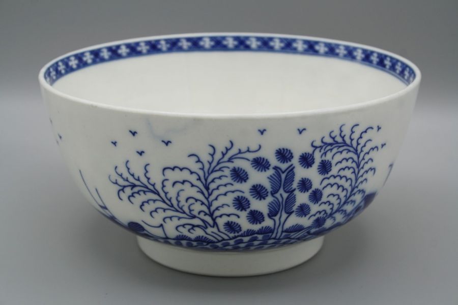 An 18th century Caughley bowl, Chinoiserie decorated in underglaze blue, 'S' mark, 15.5cm diameter